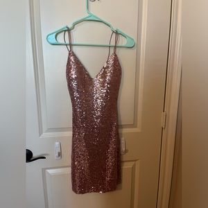 Rose gold sequin open cross back body-con mini dress